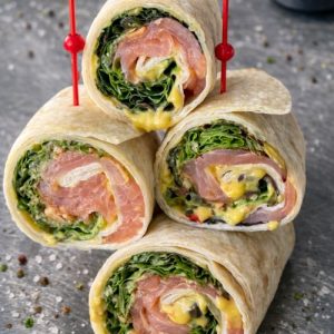 Wrap gerookte zalm, avocado en wasabi nootjes